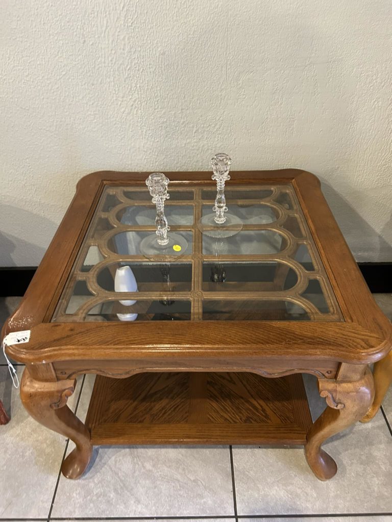 Glass topped coffee table